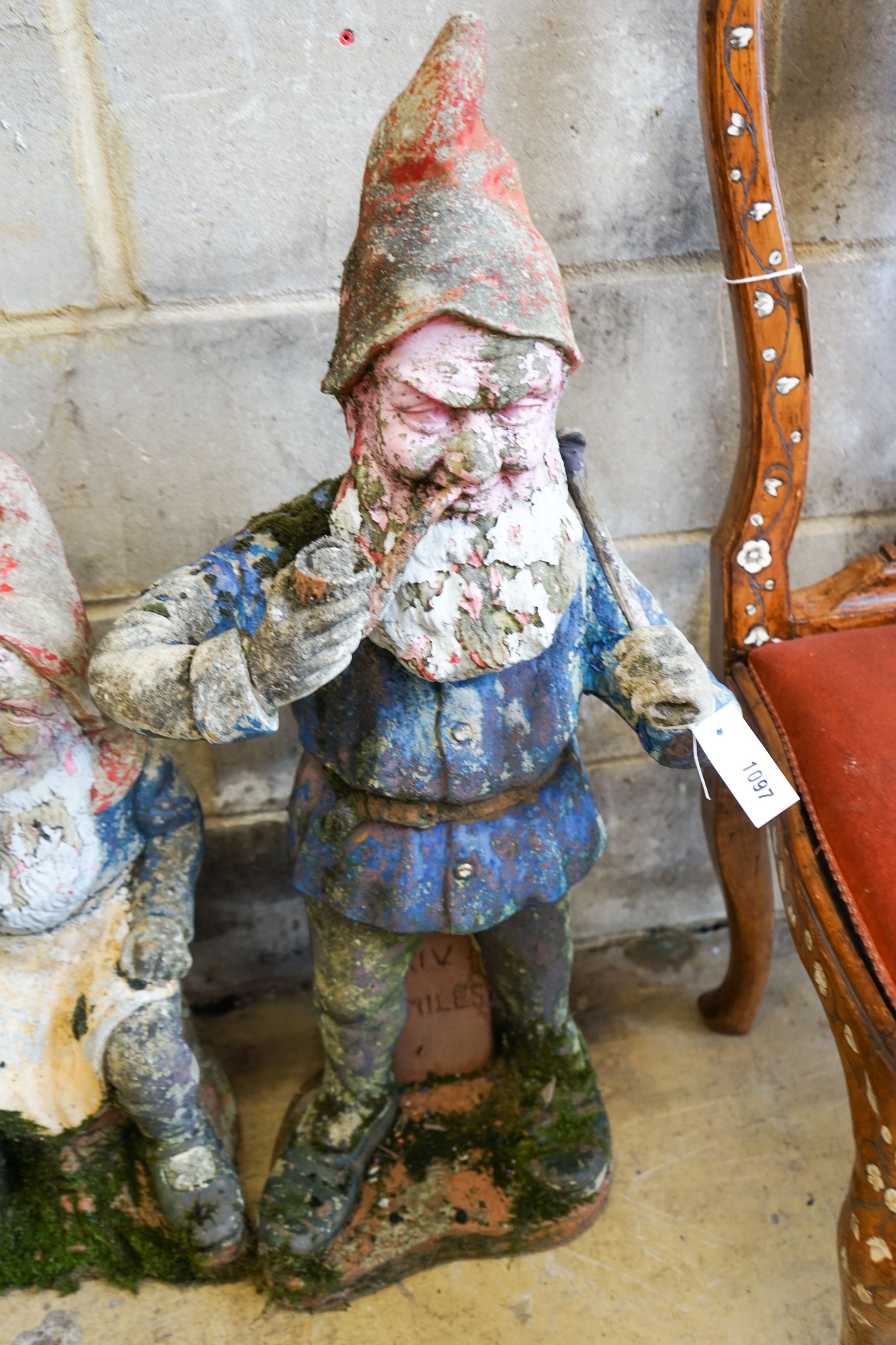 Two painted reconstituted stone garden gnome ornaments, larger height 90cm